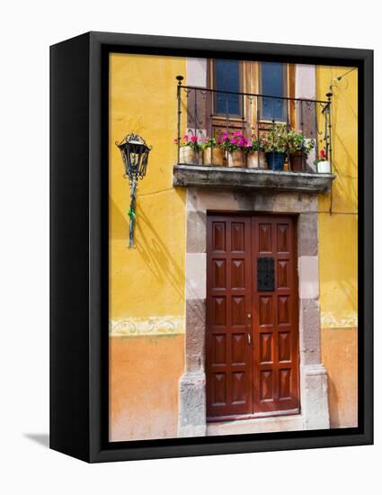 Carved Wooden Door and Balcony, San Miguel, Guanajuato State, Mexico-Julie Eggers-Framed Stretched Canvas