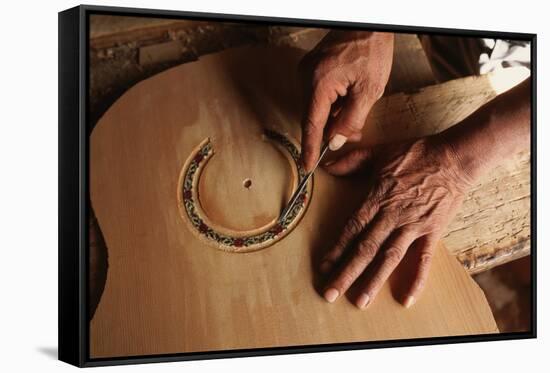 Carving a Guitar Face-Danny Lehman-Framed Stretched Canvas