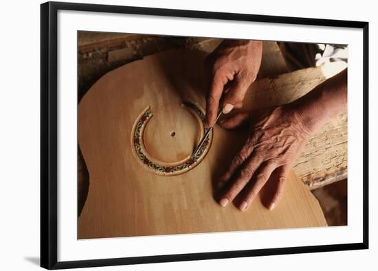 Carving a Guitar Face-Danny Lehman-Framed Photographic Print