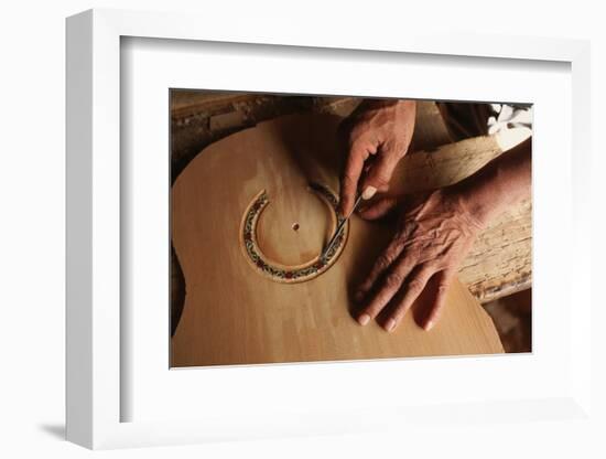 Carving a Guitar Face-Danny Lehman-Framed Photographic Print