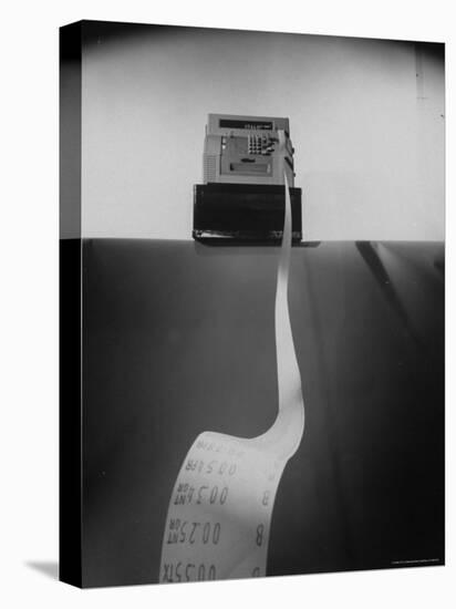 Cash Register, Type Used in Supermarkets, with Purchase Receipt Being Ejected in Foreground-Mark Kauffman-Stretched Canvas