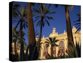 Casino Framed by Flowers and Palm Trees in Monte Carlo, Monaco, Europe-Tomlinson Ruth-Stretched Canvas