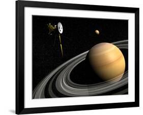 Cassini Spacecraft Orbiting Saturn and And its Moon Titan-null-Framed Art Print