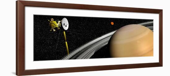 Cassini Spacecraft Orbiting Saturn and And its Moon Titan-null-Framed Art Print