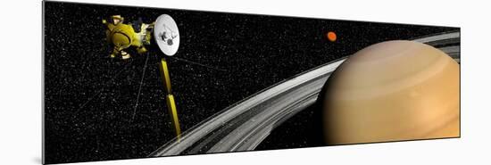 Cassini Spacecraft Orbiting Saturn and And its Moon Titan-null-Mounted Art Print