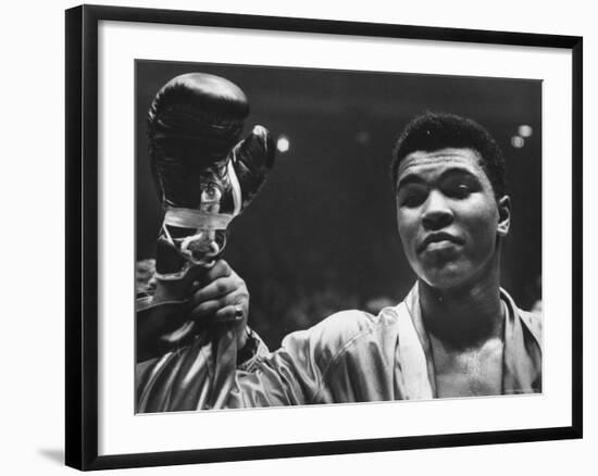 Cassius Clay After Defeating Doug Jones in Close Heavyweight Bout, in Madison Square Garden-George Silk-Framed Premium Photographic Print