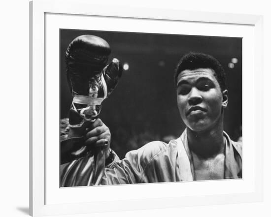 Cassius Clay After Defeating Doug Jones in Close Heavyweight Bout, in Madison Square Garden-George Silk-Framed Premium Photographic Print