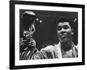 Cassius Clay After Defeating Doug Jones in Close Heavyweight Bout, in Madison Square Garden-George Silk-Framed Premium Photographic Print