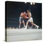 Cassius Clay, aka Muhammad Ali Throwing Famous "Phantom Punch"-George Silk-Stretched Canvas