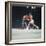 Cassius Clay, aka Muhammad Ali Throwing Famous "Phantom Punch"-George Silk-Framed Premium Photographic Print
