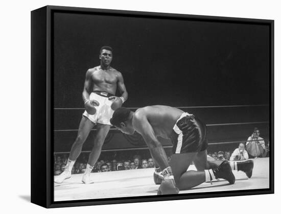 Cassius Clay Dancing Around Ring, Looking at Floyd Patterson, Whom He Has Just Knocked Down-Art Rickerby-Framed Stretched Canvas