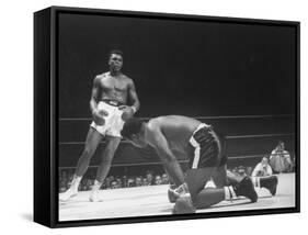 Cassius Clay Dancing Around Ring, Looking at Floyd Patterson, Whom He Has Just Knocked Down-Art Rickerby-Framed Stretched Canvas