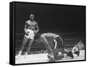 Cassius Clay Dancing Around Ring, Looking at Floyd Patterson, Whom He Has Just Knocked Down-Art Rickerby-Framed Stretched Canvas