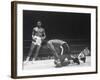 Cassius Clay Dancing Around Ring, Looking at Floyd Patterson, Whom He Has Just Knocked Down-Art Rickerby-Framed Premium Photographic Print