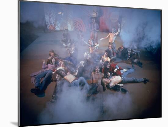 Cast Singing and Lolling About on Incense-Smoke-Filled Stage in Scene from Musical "Hair"-Ralph Morse-Mounted Photographic Print