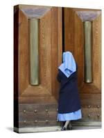 Catholic Nun Opening a Door, Rome, Lazio, Italy, Europe-Godong-Stretched Canvas