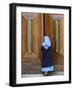 Catholic Nun Opening a Door, Rome, Lazio, Italy, Europe-Godong-Framed Photographic Print