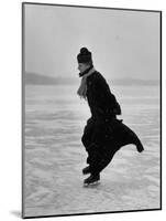 Catholic Priest Ice Skating. from Photo Essay Re Polish American Community-John Dominis-Mounted Photographic Print
