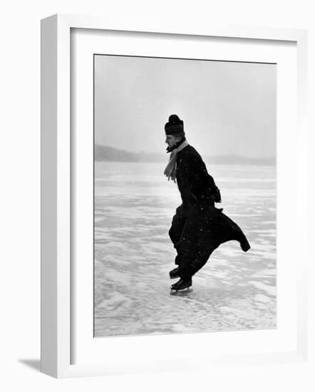 Catholic Priest Ice Skating-John Dominis-Framed Photographic Print