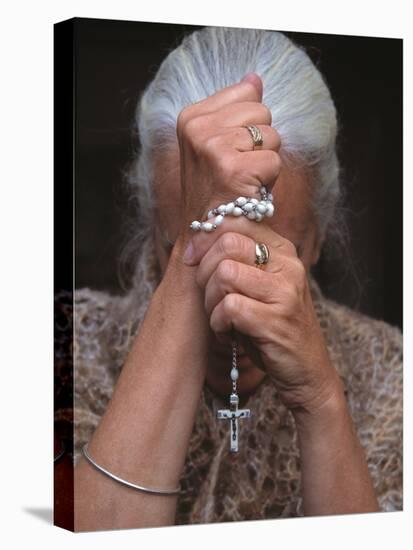 Catholic Woman Prays Holding Her Rosary-null-Stretched Canvas