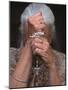 Catholic Woman Prays Holding Her Rosary-null-Mounted Photographic Print