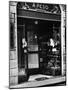 Cats Perching Outside Entrance to Perfume Shop-Alfred Eisenstaedt-Mounted Photographic Print