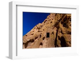 Cave dwellings on the Cliffside of Pueblo Indian Ruins in Bandelier National Monument, USA-Laura Grier-Framed Photographic Print