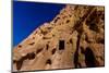 Cave dwellings on the Cliffside of Pueblo Indian Ruins in Bandelier National Monument, USA-Laura Grier-Mounted Photographic Print