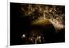 Cavers shining lamps on bats in Pokhara Bat Caves, Pokhara, Nepal, Asia-Laura Grier-Framed Photographic Print