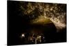 Cavers shining lamps on bats in Pokhara Bat Caves, Pokhara, Nepal, Asia-Laura Grier-Stretched Canvas