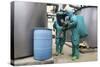 Cbrn Defense Specialists Check a Barrel for Contamination-null-Stretched Canvas