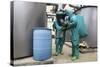 Cbrn Defense Specialists Check a Barrel for Contamination-null-Stretched Canvas