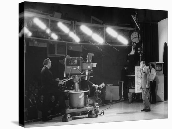 CBS Cameraman Filming Ed Sullivan During "The Ed Sullivan Show," Cue Cards are Visible Behind Him-Arthur Schatz-Stretched Canvas