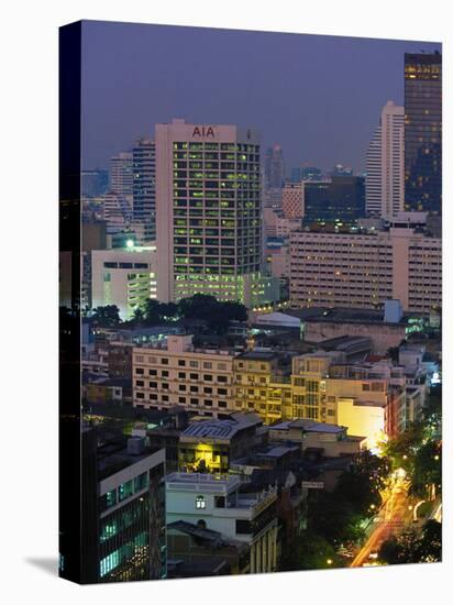 Central Bangkok, Dusk, Thailand-Walter Bibikow-Stretched Canvas