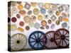 Ceramic Plates and Wagon Wheels, Algarve, Portugal-Merrill Images-Stretched Canvas