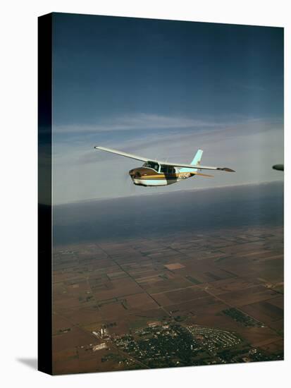 Cessna 210 Centurion Flying-null-Stretched Canvas