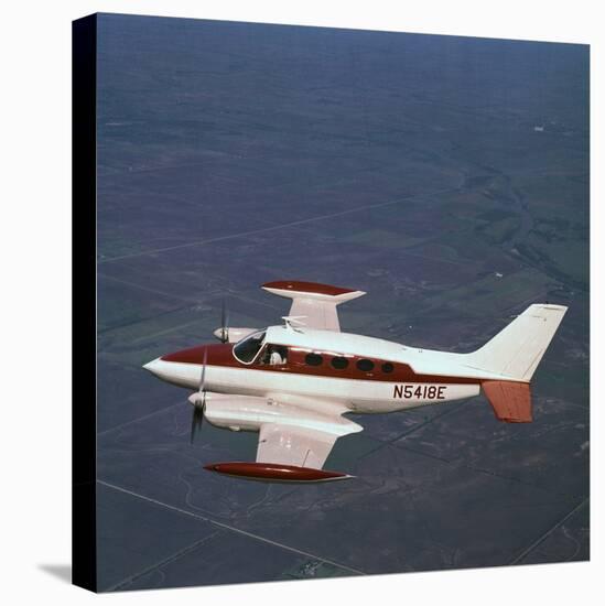 Cessna Airplane Flying-null-Stretched Canvas