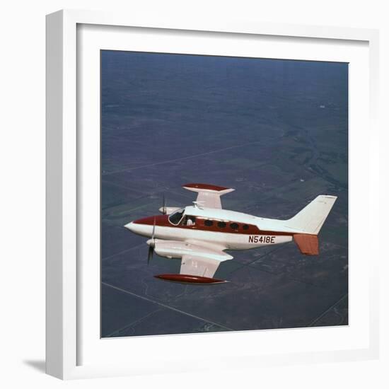 Cessna Airplane Flying-null-Framed Photographic Print