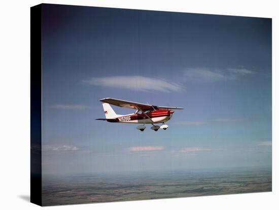 Cessna Skyhawk Flying-null-Stretched Canvas