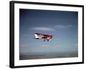 Cessna Skyhawk Flying-null-Framed Photographic Print