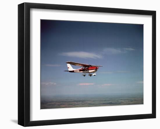 Cessna Skyhawk Flying-null-Framed Photographic Print