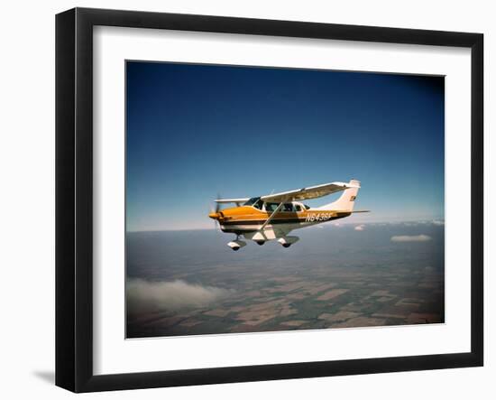 Cessna Superlobe Flying-null-Framed Premium Photographic Print