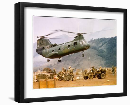 Ch-46 Helicopter Picking up Supplies-null-Framed Premium Photographic Print