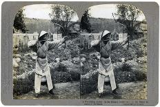 Feeding a Prisoner Wearing a Cangue, China, 1902-CH Graves-Photographic Print