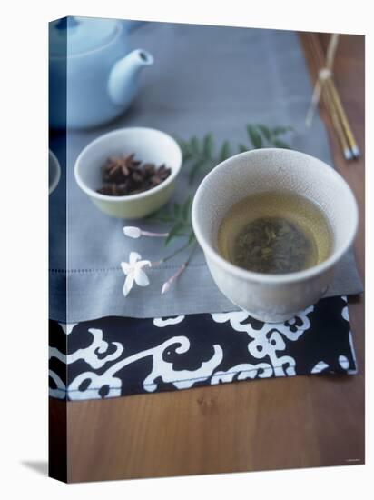 Chai Tea in Tea Bowl, Star Anise Behind-Deirdre Rooney-Stretched Canvas