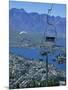 Chair Lift with Lake Wakatipu, the Remarkable Mountains and Queenstown, South Island, New Zealand-Jeremy Bright-Mounted Photographic Print