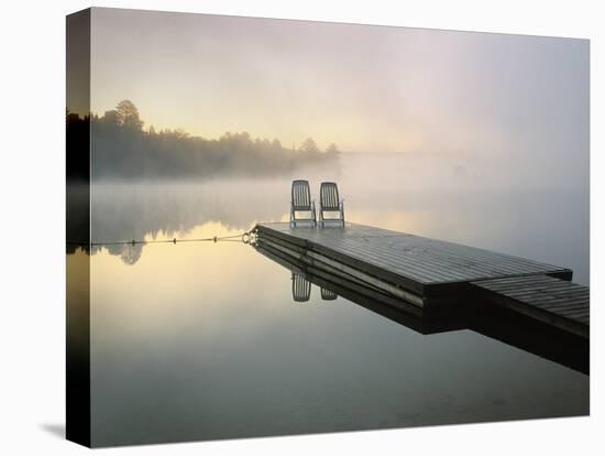 Chairs on Dock, Algonquin Provincial Park, Ontario, Canada-Nancy Rotenberg-Stretched Canvas