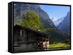 Chalet and Mountains, Grindelwald, Bern, Switzerland, Europe-Richardson Peter-Framed Stretched Canvas