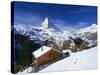 Chalets in a Snowy Landscape with the Matterhorn Peak, Near Zermatt, Swiss Alps, Switzerland-null-Stretched Canvas