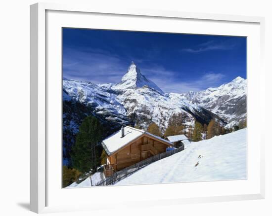 Chalets in a Snowy Landscape with the Matterhorn Peak, Near Zermatt, Swiss Alps, Switzerland-null-Framed Photographic Print